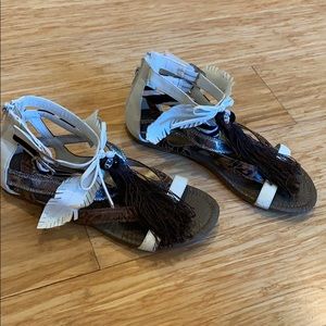 Make a statement with these strapped sandals